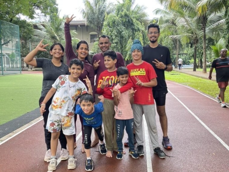 VHR Sports families, children and coaches together on the running track at Lodha Amara, Thane