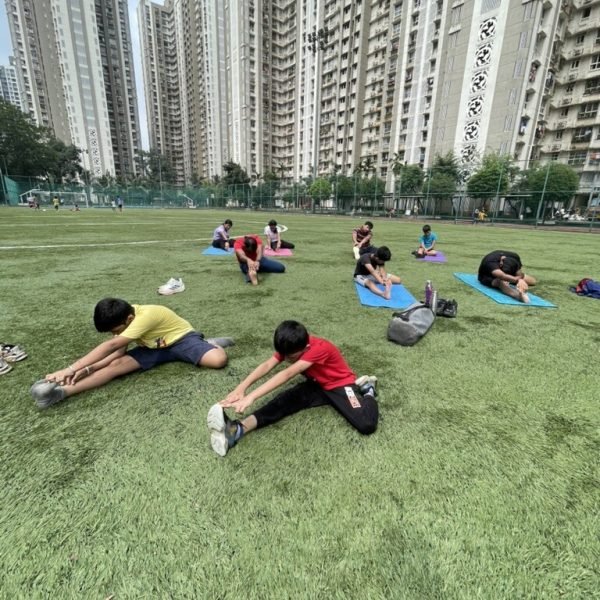 Group cool-down and stretching after training at VHR Sports