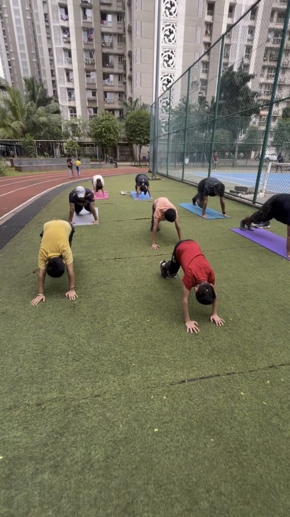 A full batch doing plank core training together at VHR Sports