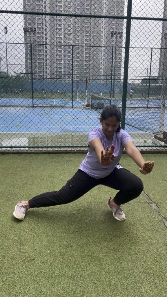 Adult stretching during a VHR Sports Corporate Warrior session