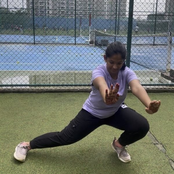 Adult stretching during a VHR Sports Corporate Warrior session