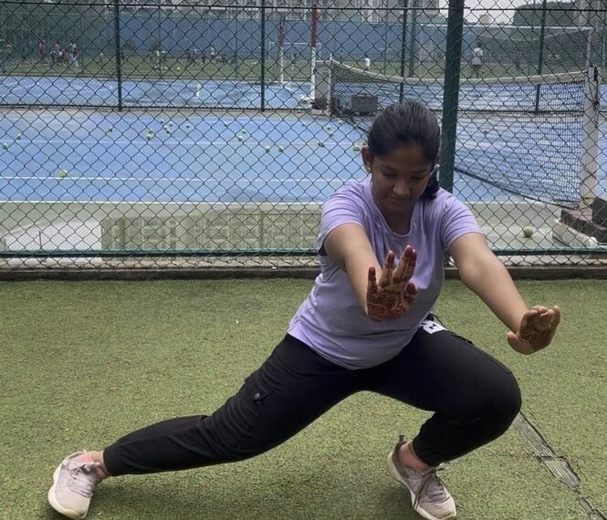 Adult stretching during a VHR Sports Corporate Warrior session