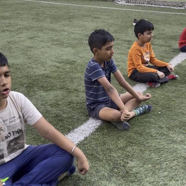 Athletes during the meditation phase of a Elite Junior Athletes session at VHR Sports