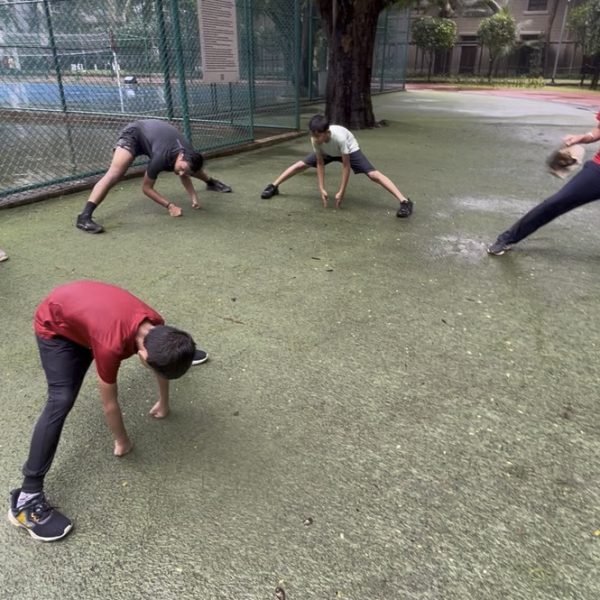 Athletes during the warm-up phase of a Future Champions session at VHR Sports