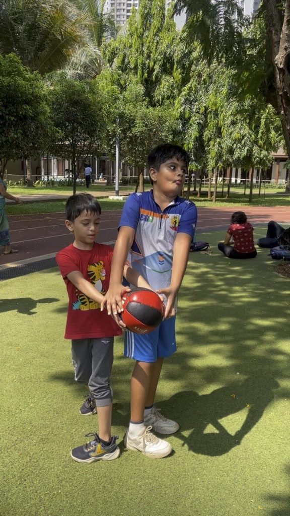 Children doing partner medicine-ball training at VHR Sports