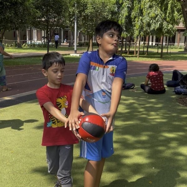 Children doing partner medicine-ball training at VHR Sports