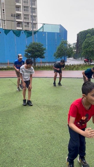 Athletes during the warm-up phase of a Little Champions session at VHR Sports