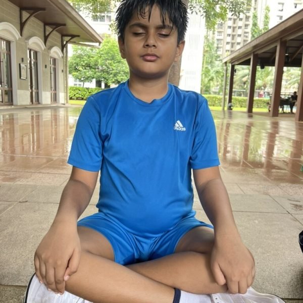 Young athlete in seated meditation during a VHR Sports Mind Athlete session