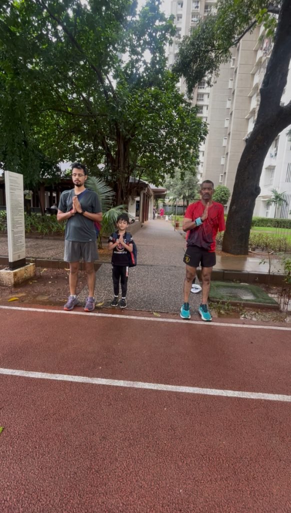 Athletes and coach beginning training with a prayer at VHR Sports