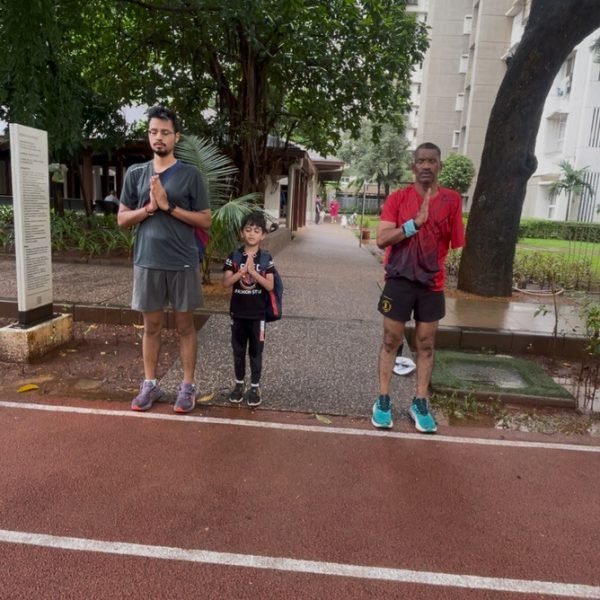 Athletes and coach beginning training with a prayer at VHR Sports