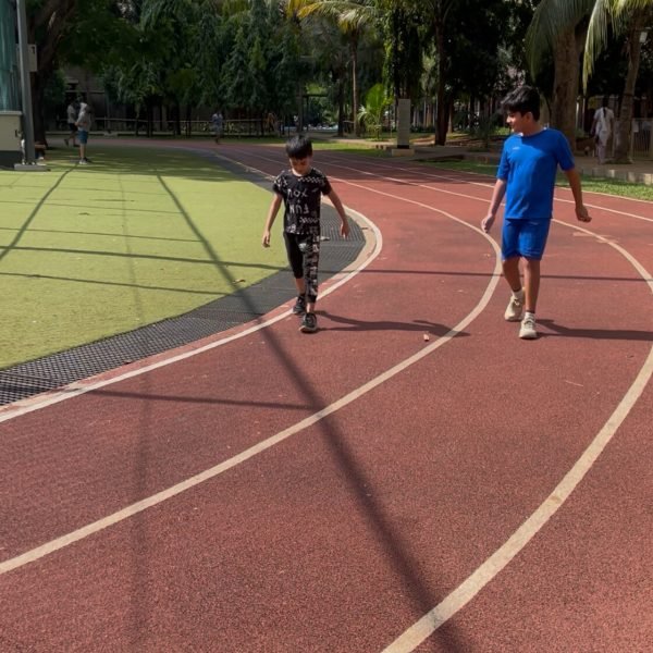 Athlete running on the track at VHR Sports, Lodha Amara